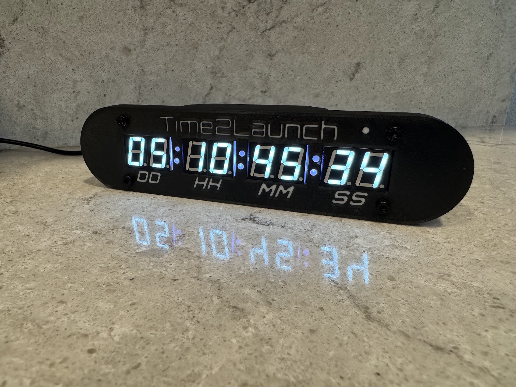 Time2Launch connected countdown timer displaying a rocket launch countdown